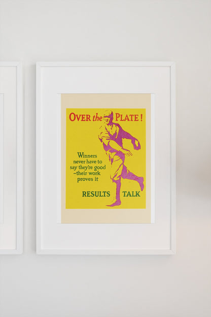 Over the Plate poster in a white frame on a light wall