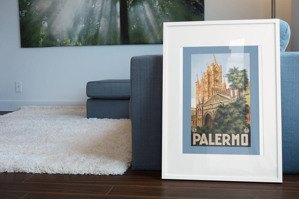 Palermo Cathedral poster leaning beside a blue sofa
