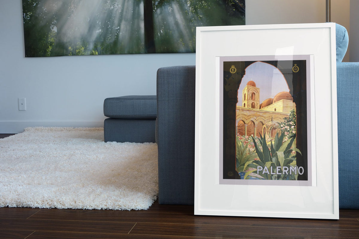 Palermo Sicily poster leaning beside a blue sofa
