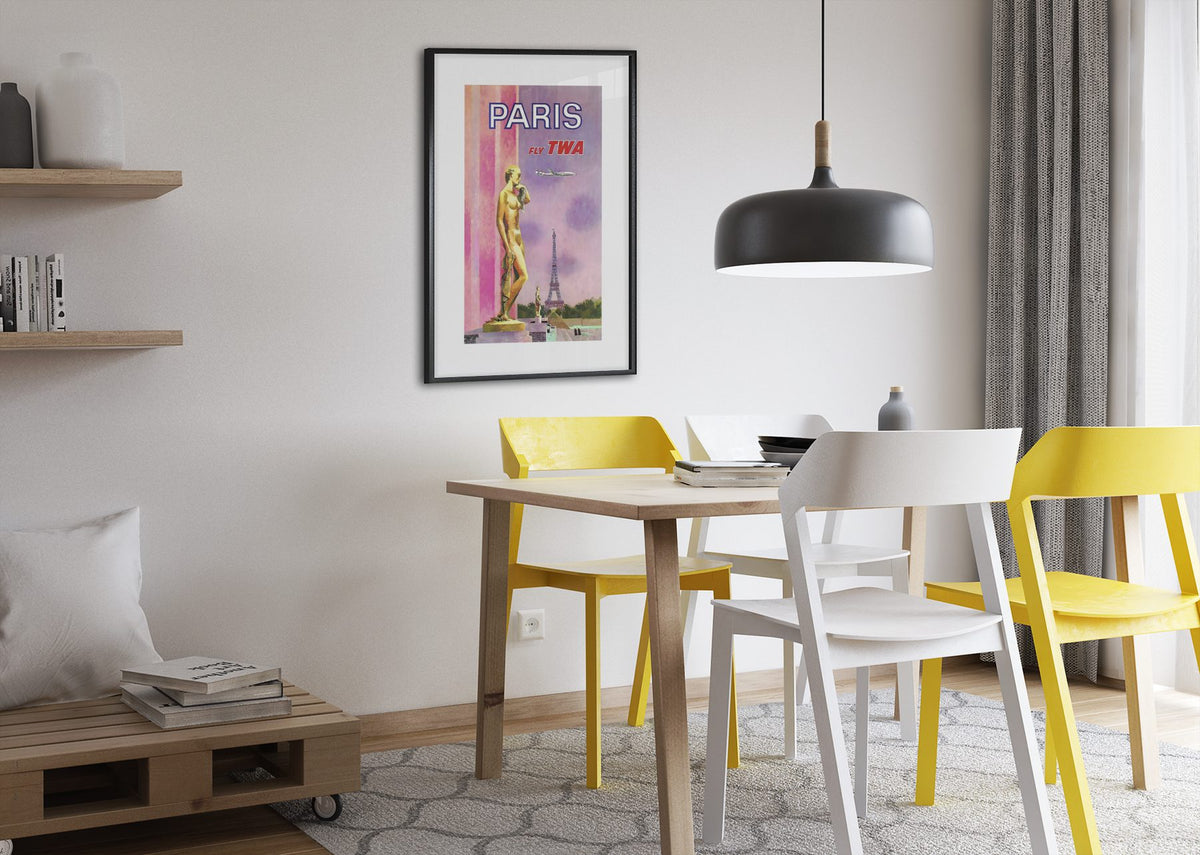 Paris Fly TWA 1969 poster framed above a dining table