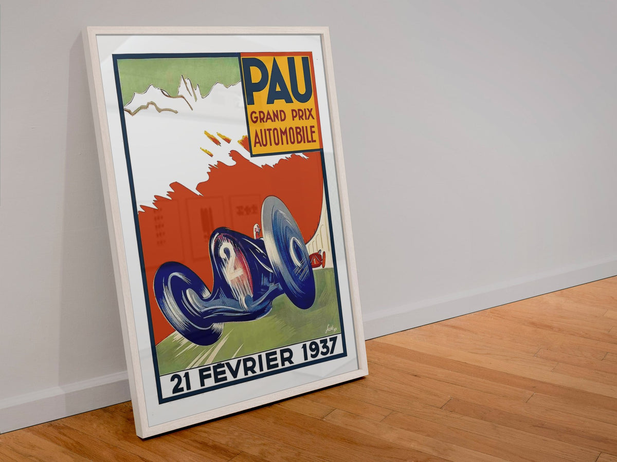 Pau Grand Prix 1937 poster in a white frame leaning against a wall