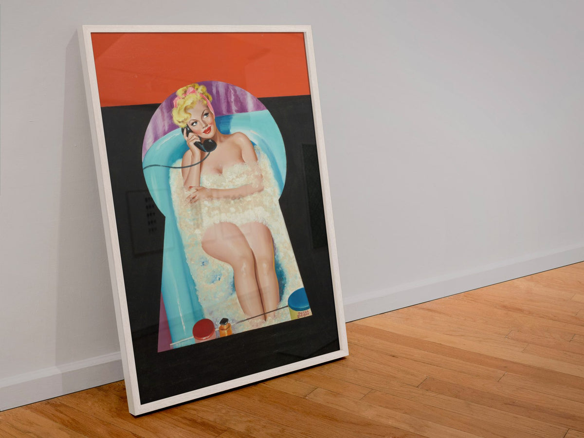 Peek-a-Boo poster in a white frame leaning against a wall