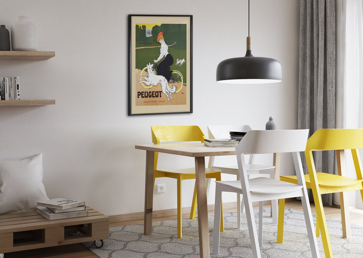 Peugeot Bicycles poster framed above a dining table