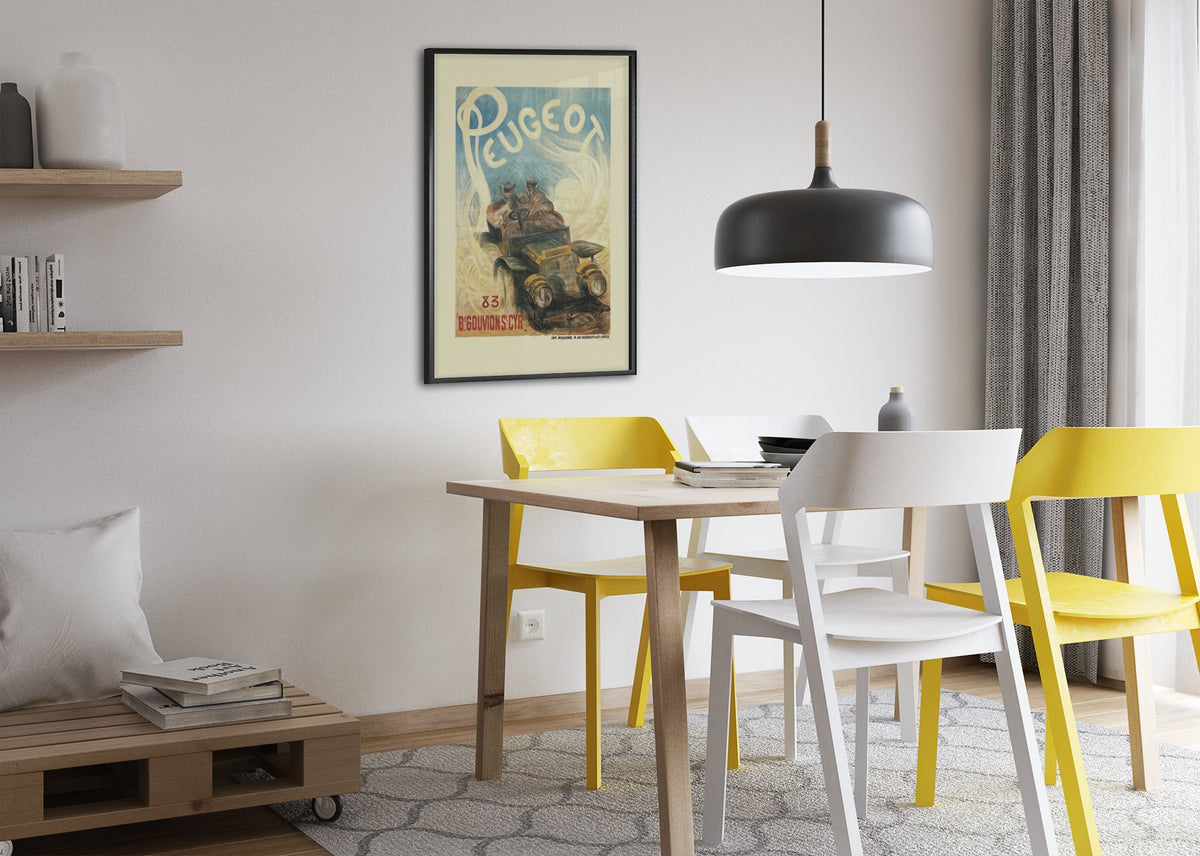 Peugeot poster framed above a dining table