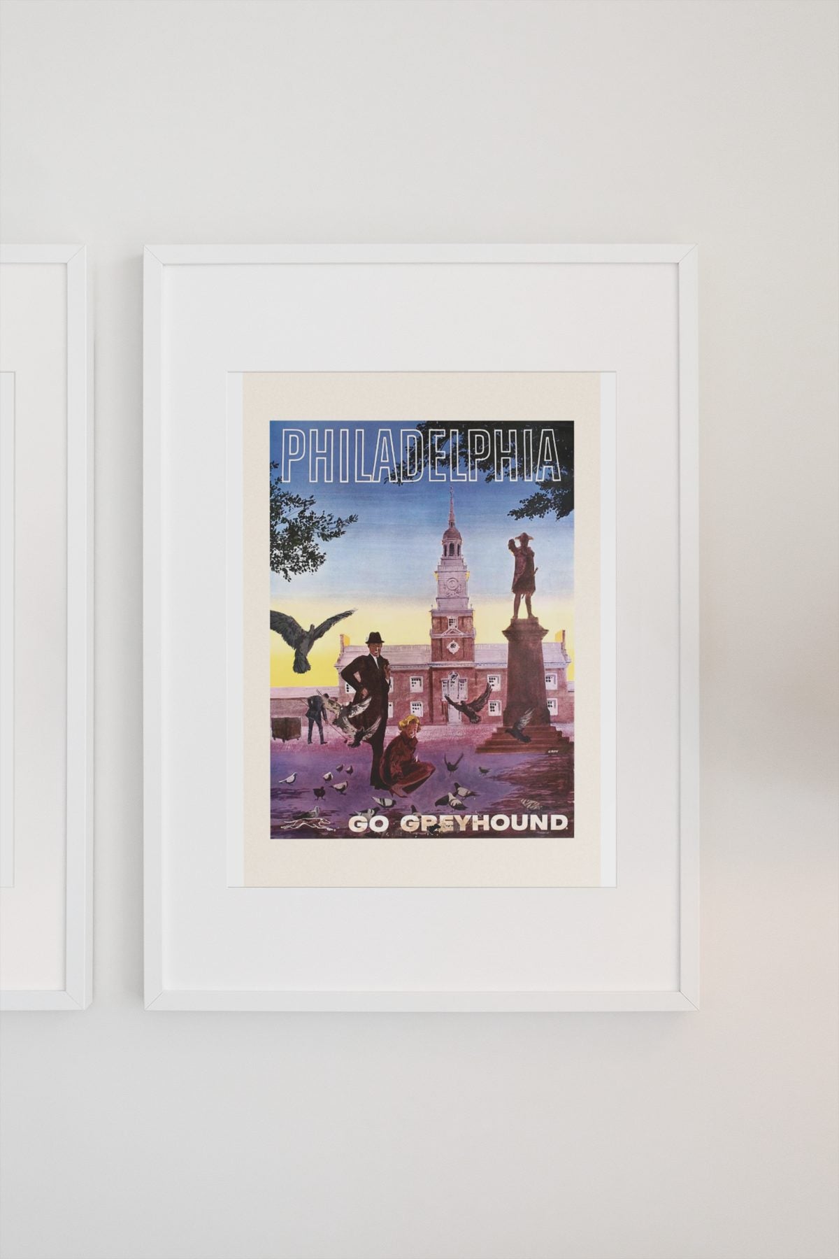 Philadelphia Go Greyhound poster on a light wall