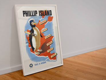 Phillip Island Penguin Map poster in a white frame leaning against a wall