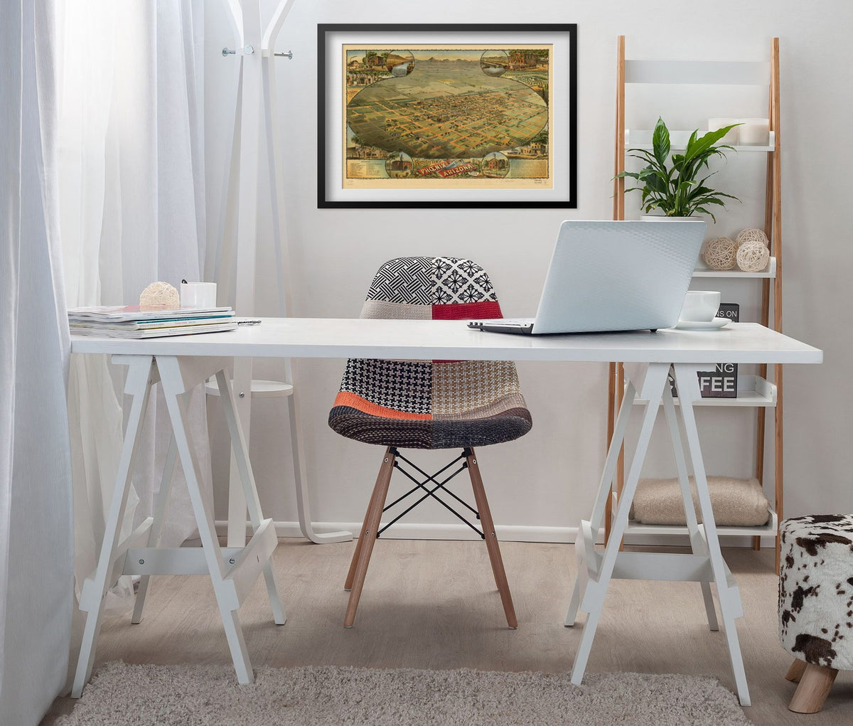 Phoenix 1885 Panoramic Map framed above a white desk in a home office