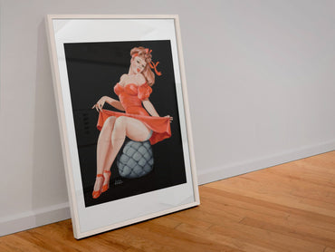 Pin Cushion poster in a white frame leaning against a wall