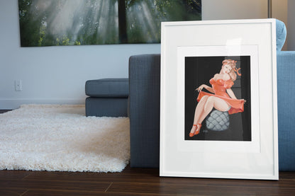 Pin Cushion poster leaning beside a blue sofa