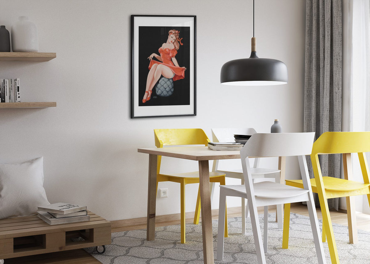 Pin Cushion poster framed above a dining table