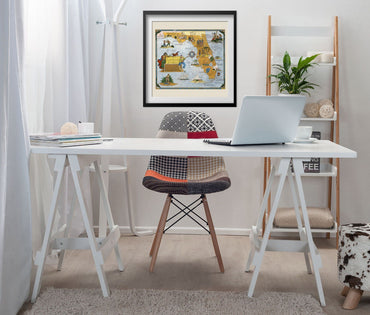 Pirate Treasure of Florida Map print framed above a white desk in a home office