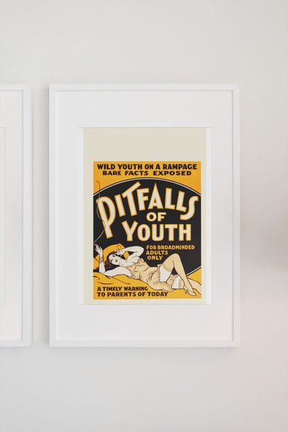 Pitfalls of Youth poster on a light wall