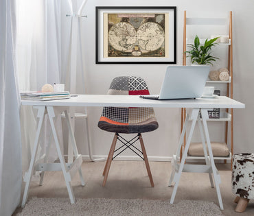 Planiglobii Terrestris 1695 framed above a white desk in a home office
