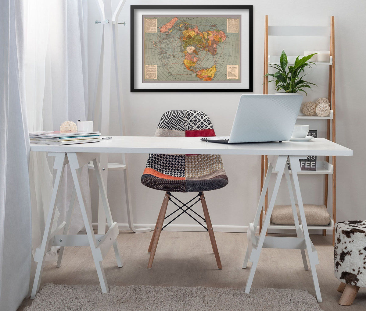 Polar Projection 1943 War Map print framed above a white desk in a home office
