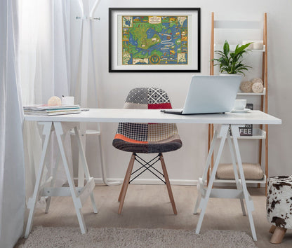 Portland Maine 1920s Pictorial Map print framed above a white desk in a home office
