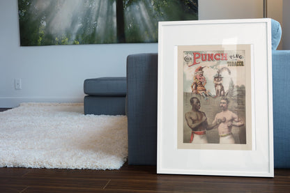 Punch Plug Tobacco Boxing poster leaning beside a blue sofa