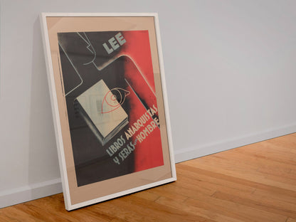 Read Anarchist Books poster in a white frame leaning against a wall