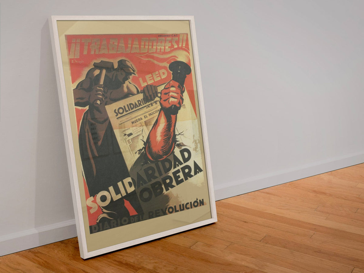 Read Solidaridad Obrera Workers Solidarity poster in a white frame leaning against a wall