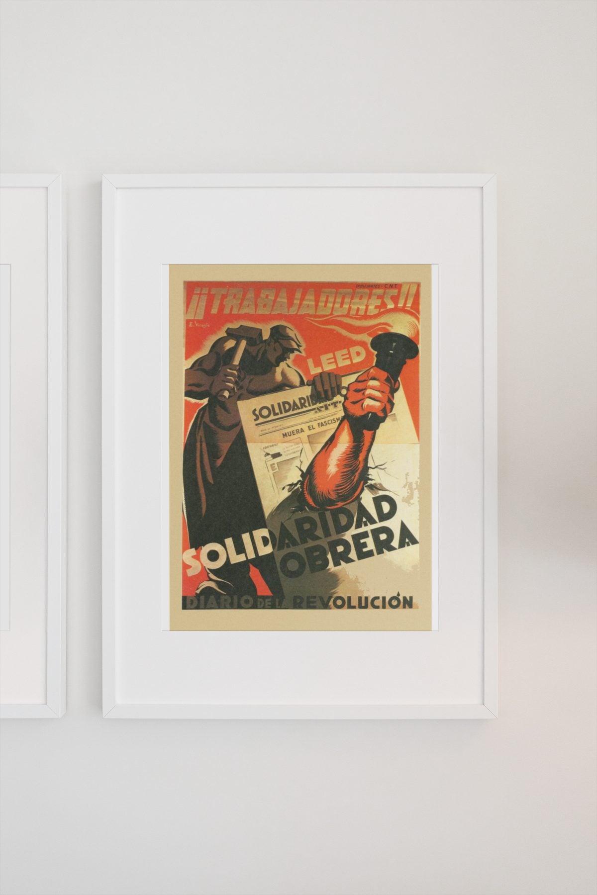 Read Solidaridad Obrera Workers Solidarity poster on a light wall