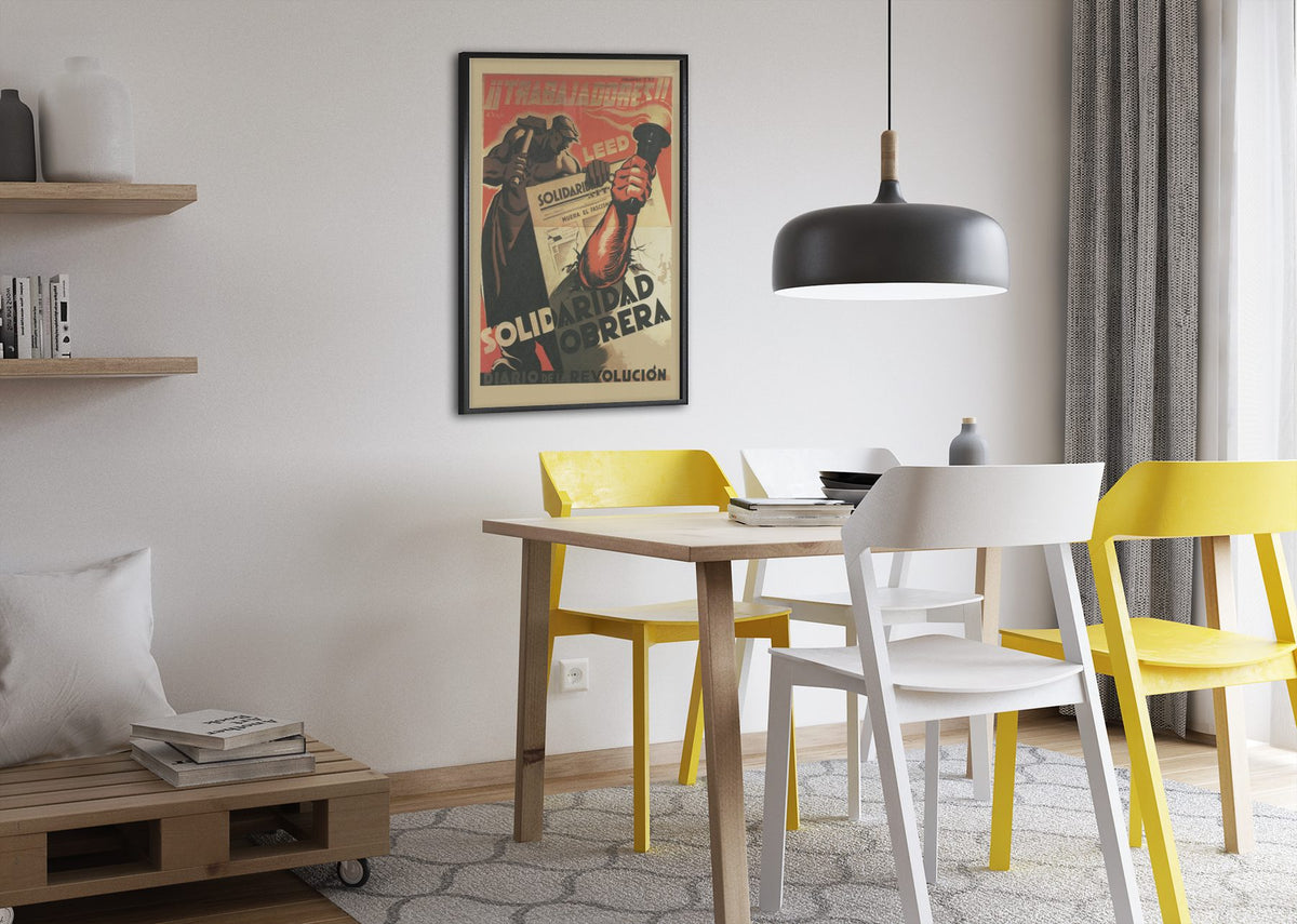 Read Solidaridad Obrera Workers Solidarity poster framed above a dining table