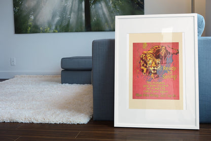 Ready to Spring poster in a white frame leaning beside a blue sofa