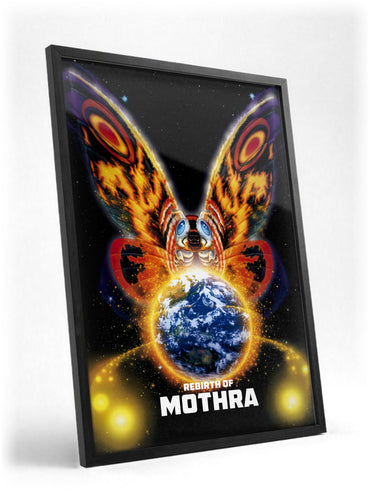 Rebirth of Mothra (1996) Movie Key Art poster in a black frame with glass leaning against a wall