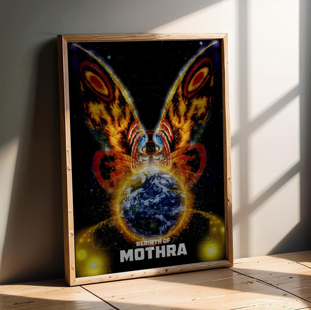 Rebirth of Mothra (1996) Movie Key Art poster in an oak frame leaning on a wooden floor