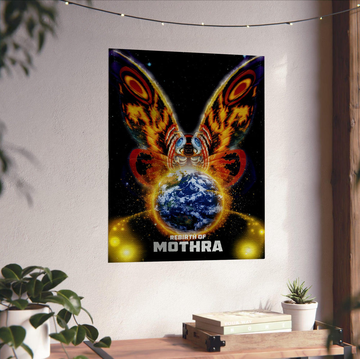 Rebirth of Mothra (1996) Movie Key Art poster unframed on a white wall above a desk