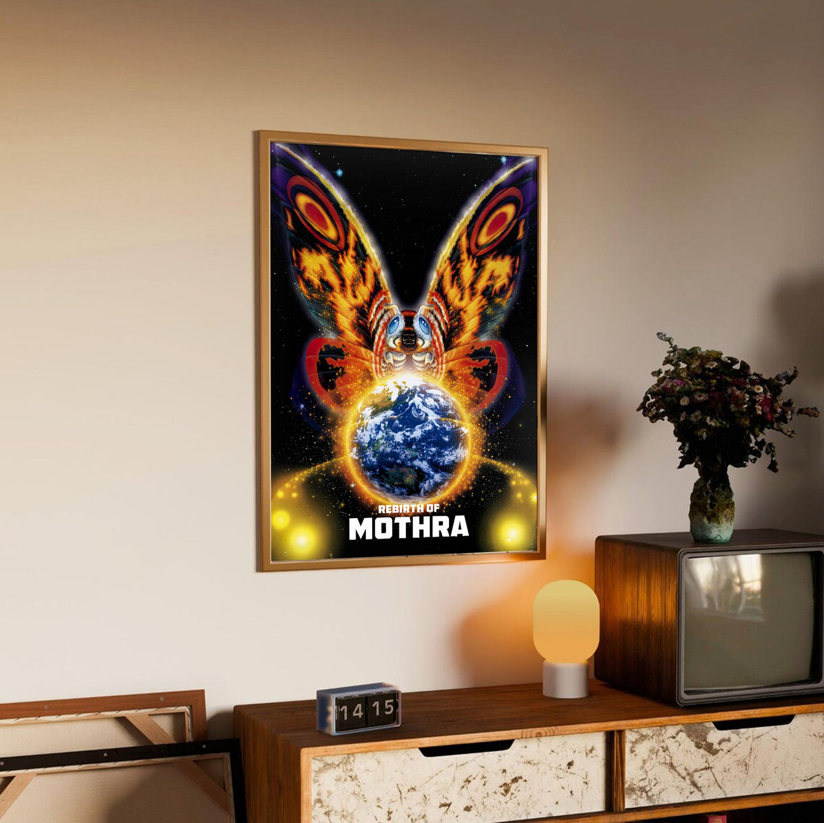 Rebirth of Mothra (1996) Movie Key Art poster in an oak frame above a sideboard
