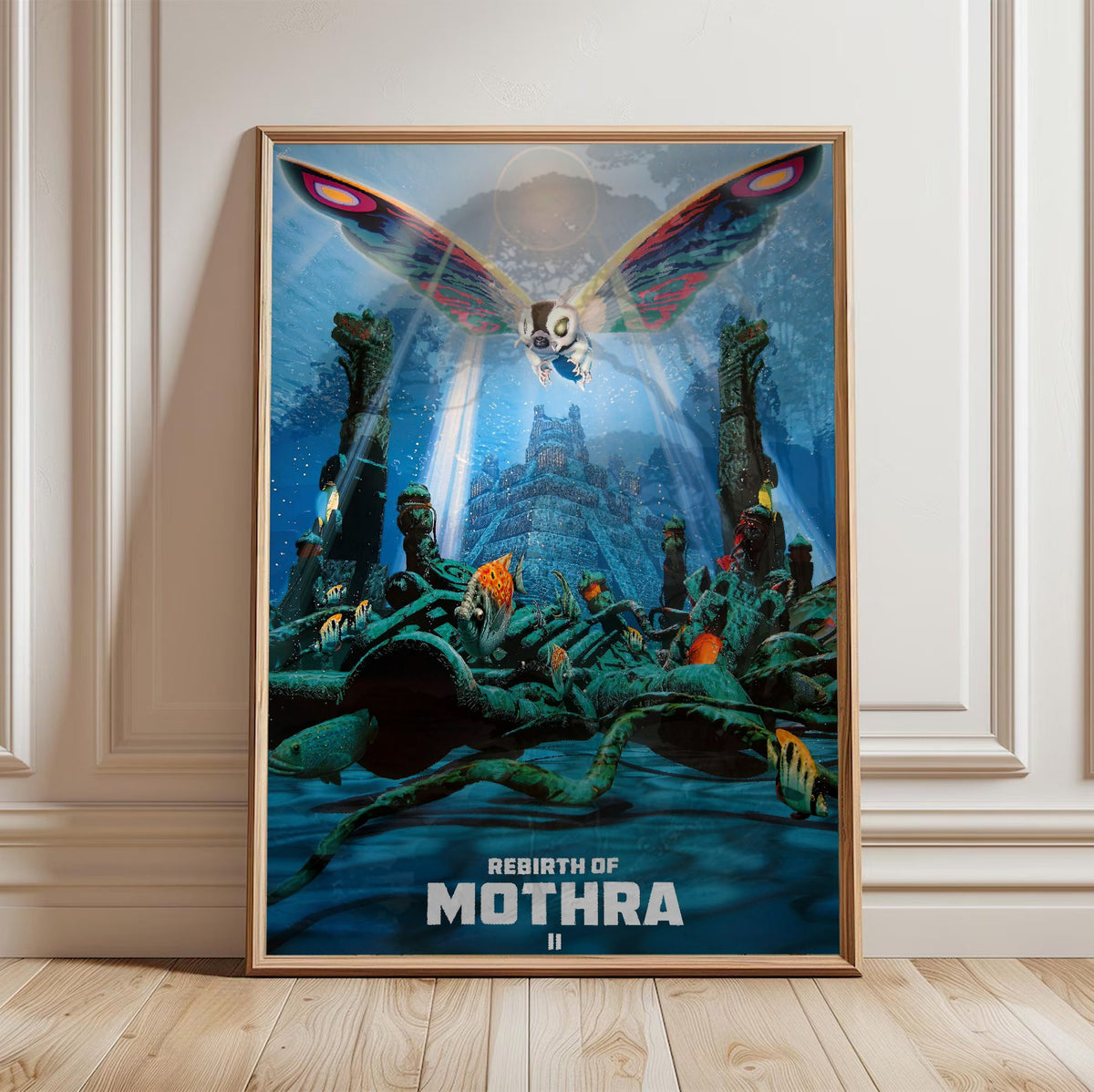 Rebirth of Mothra II (1997) Movie Key Art poster in a light oak frame leaning against a white wall