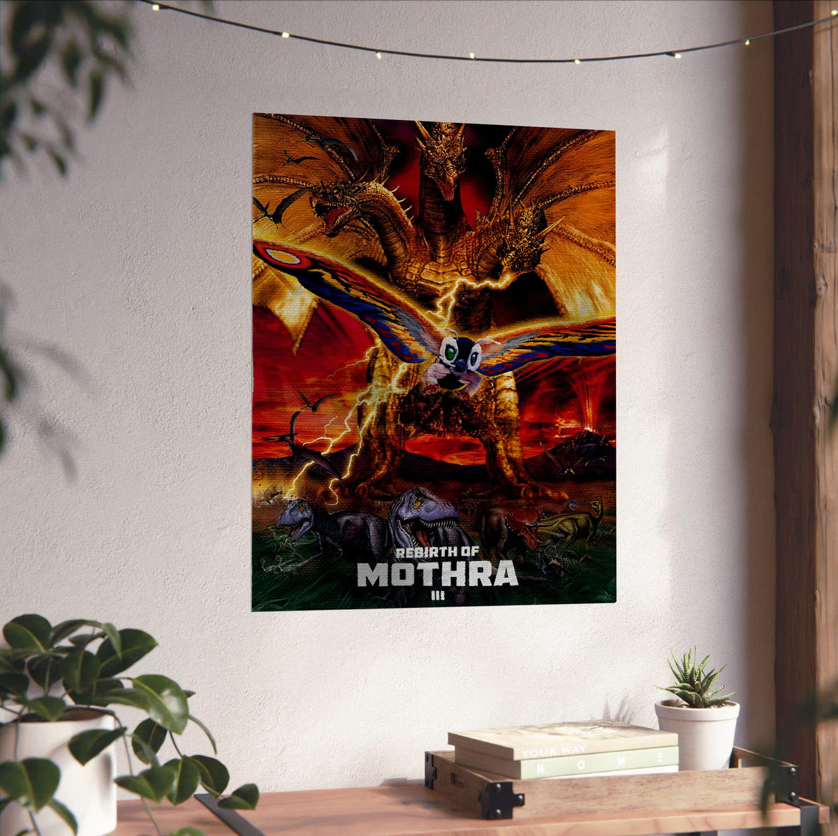 Rebirth of Mothra III (1998) Movie Key Art poster unframed on a white wall above a desk