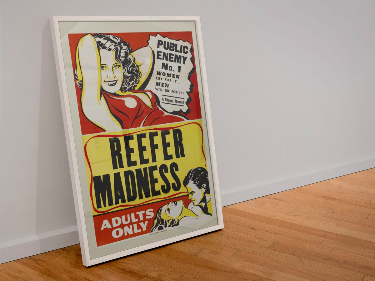 Reefer Madness Adults Only poster in a white frame leaning against a wall