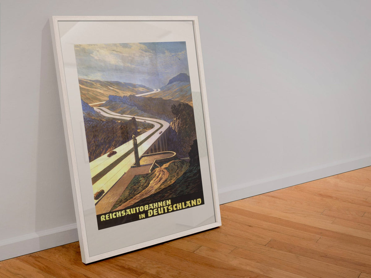 Reichsautobahnen in Deutschland poster in a white frame leaning against a wall