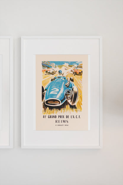 Grand Prix de l'ACF Reims 1954 poster in a white frame on a light wall