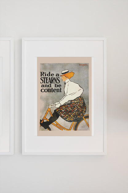 Ride a Stearns and Be Content poster on a light wall