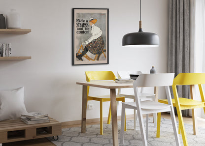 Ride a Stearns and Be Content poster framed above a dining table