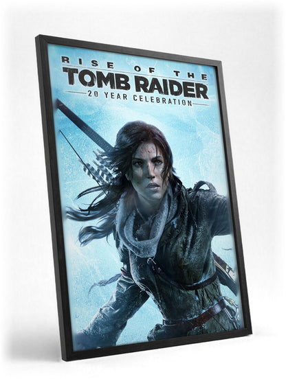 Rise of the Tomb Raider 20 Year Celebration Art poster in a black frame with glass leaning against a wall