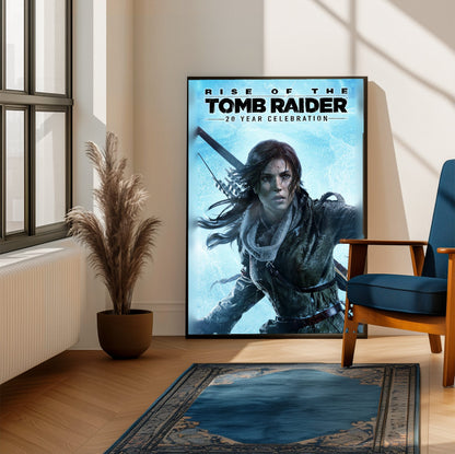 Rise of the Tomb Raider 20 Year Celebration Art poster framed beside a blue armchair in a sunlit room