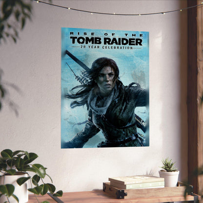 Rise of the Tomb Raider 20 Year Celebration Art poster unframed on a white wall above a desk