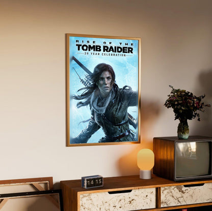 Rise of the Tomb Raider 20 Year Celebration Art poster in an oak frame above a sideboard