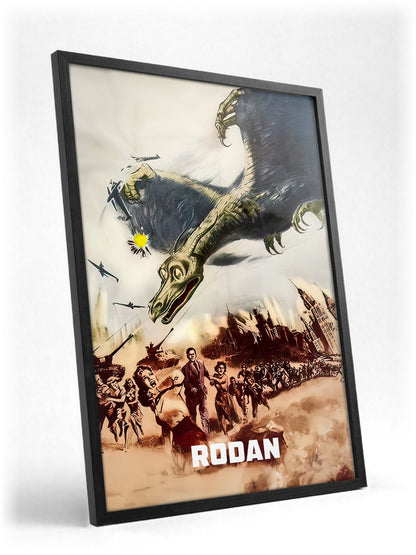 Rodan (1956) Movie Illustrated Art poster in a black frame with glass leaning against a wall