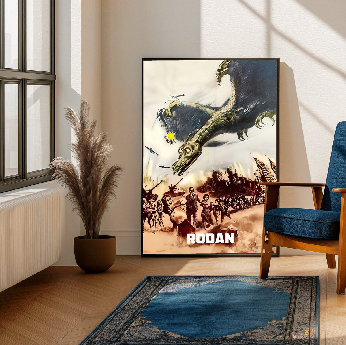 Rodan (1956) Movie Illustrated Art poster framed beside a blue armchair in a sunlit room