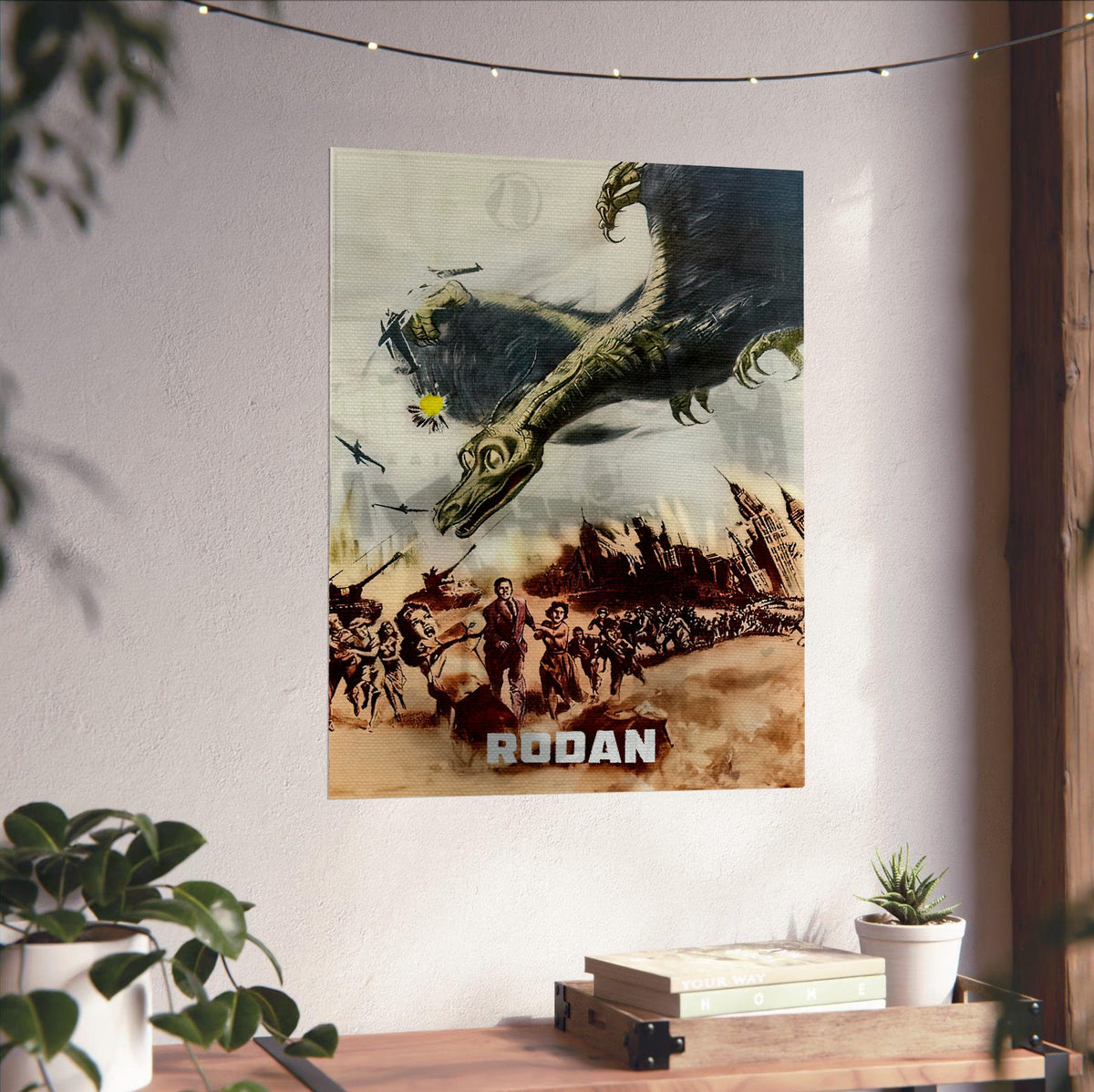 Rodan (1956) Movie Illustrated Art poster unframed on a white wall above a desk