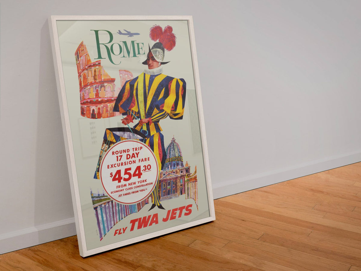 Rome Fly TWA Jets poster in a white frame leaning against a wall