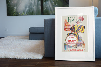 Rome Fly TWA Jets poster leaning beside a blue sofa