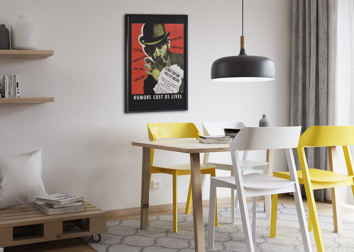 Rumors Cost Us Lives poster framed above a dining table