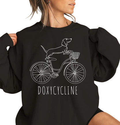 Doxycycline Dachshund Bicycle Sweatshirt – Funny Vet Tech Dog Lover Pullover – Cute Wiener Dog Pun Shirt