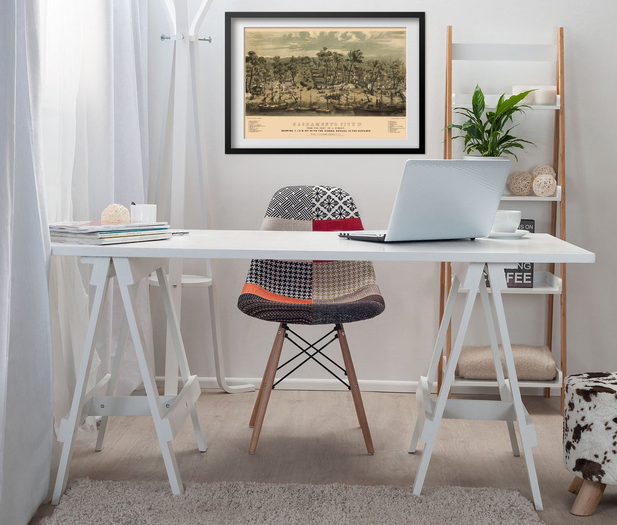 Sacramento 1849 Panoramic Map framed above a white desk in a home office