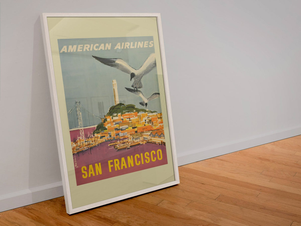 San Francisco American Airlines poster in a white frame leaning against a wall