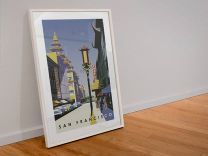 San Francisco Chinatown poster in a white frame leaning against a wall
